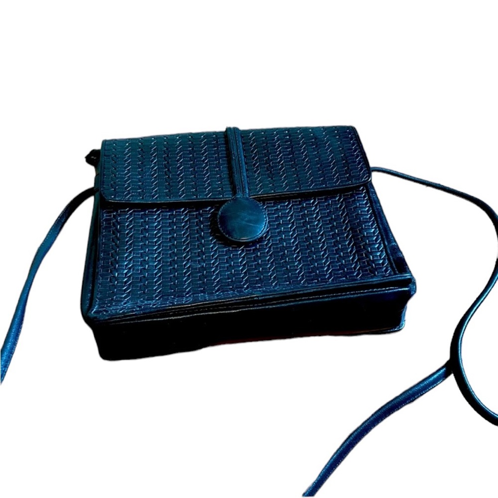 Black leather shoulder bag with adjustable strap.
